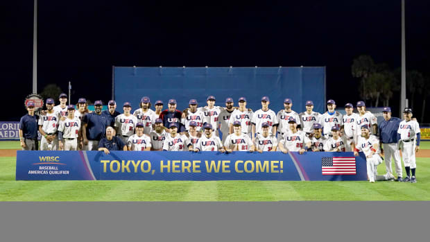 Jun 5, 2021; Port St. Lucie, Florida, USA; USA players pose for a picture after defeating Venezuela in the Super Round of the WBSC Baseball Americas Qualifier series game at Clover Park, and qualifying for the Olympic Games in Tokyo Japan.